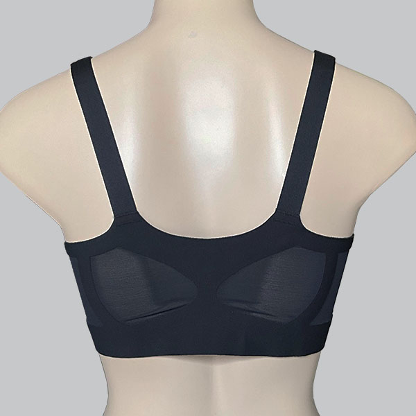 Back of the Esra padded wireless mastectomy bra showing wider back band with mesh panels.